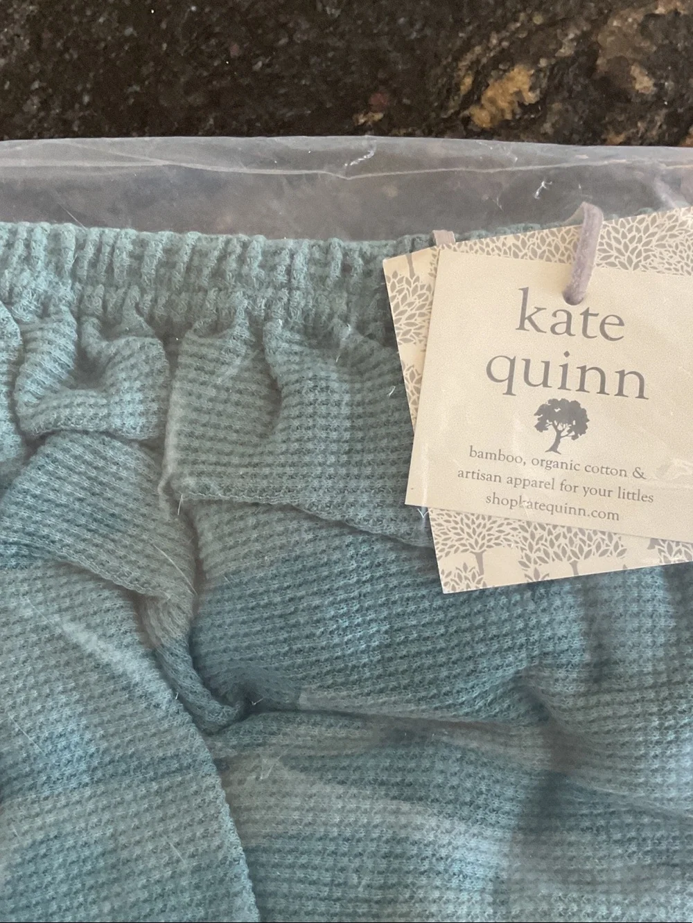 kate quinn Teal and Tan Waffle Knit and Solid Crib Sheets fits on a crib mattr